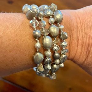 Handcrafted four strand bead bracelet